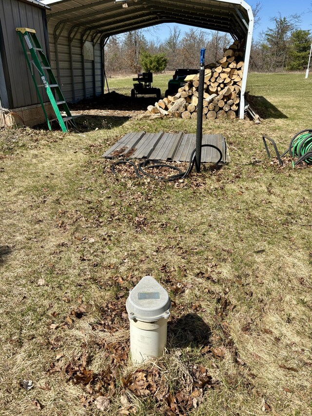 view of yard featuring a carport