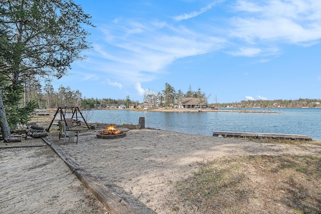 water view featuring an outdoor fire pit