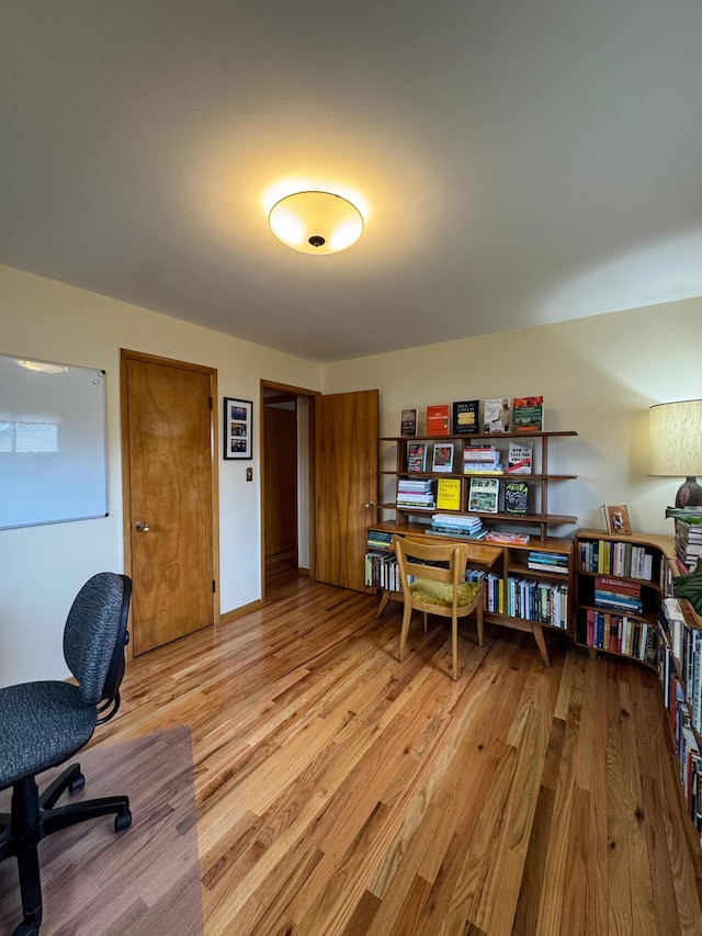 home office featuring light wood finished floors