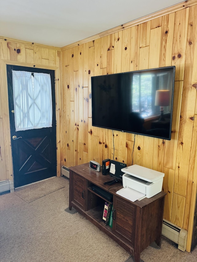17745 Shubert Hwy, Alpena, MI 49707 - living room with carpet flooring, baseboard heating, wood walls, and a desk