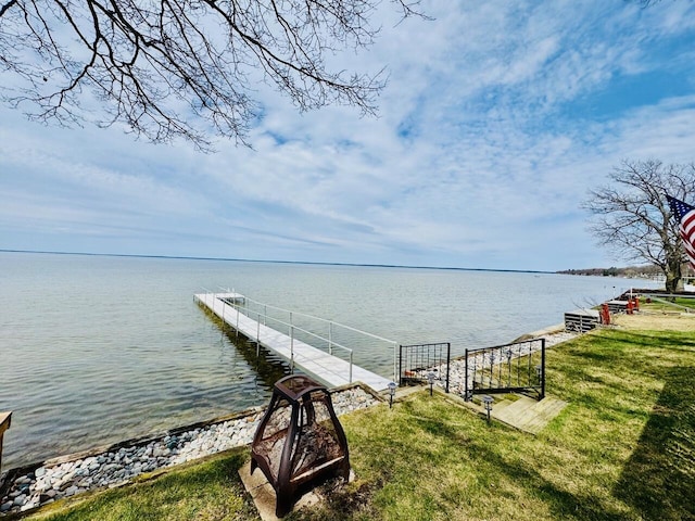 1106 Houghton View Dr, Houghton Lake, MI 48629 - dock with a water view and a yard