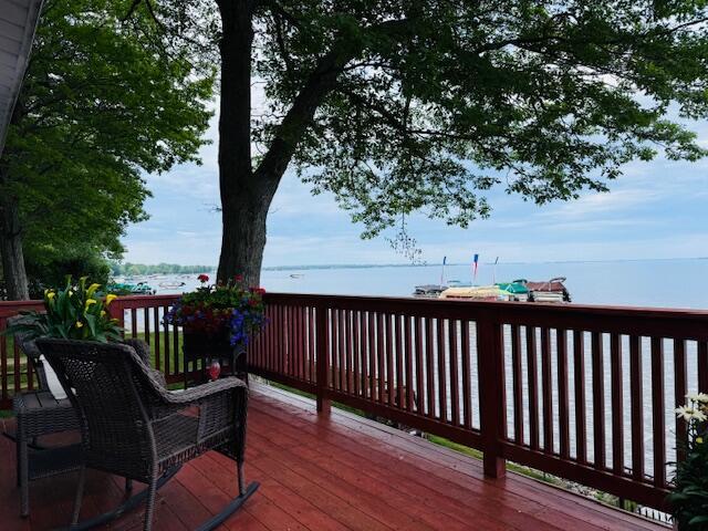 1106 Houghton View Dr, Houghton Lake, MI 48629 - wooden deck featuring a water view