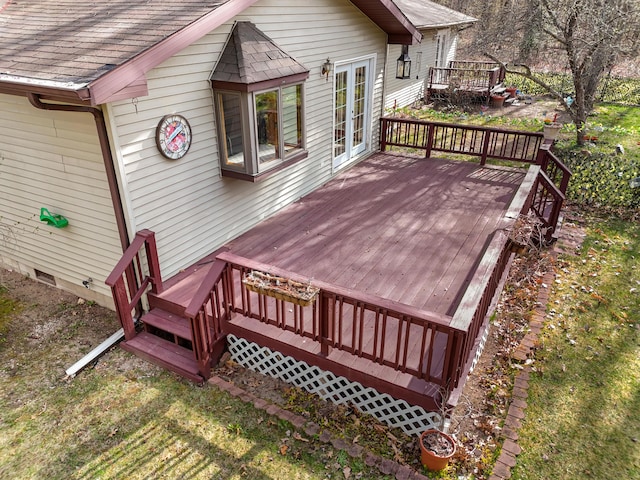 321 Greenleaf Dr, Houghton Lake, MI 48629 - wooden deck featuring french doors