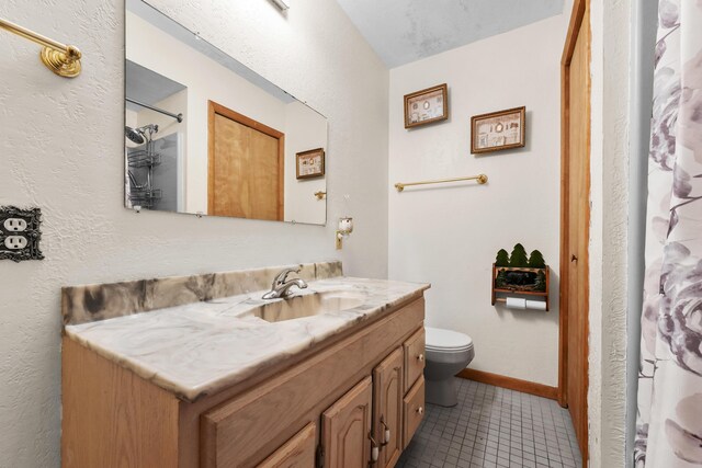 321 Greenleaf Dr, Houghton Lake, MI 48629 - full bathroom featuring tile patterned flooring, vanity, toilet, a shower with shower curtain, and baseboards