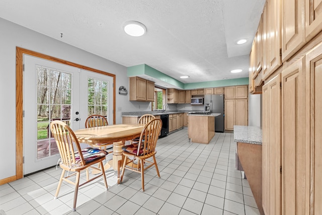 321 Greenleaf Dr, Houghton Lake, MI 48629 - dining space with light tile patterned flooring, a textured ceiling, french doors, recessed lighting, and baseboards