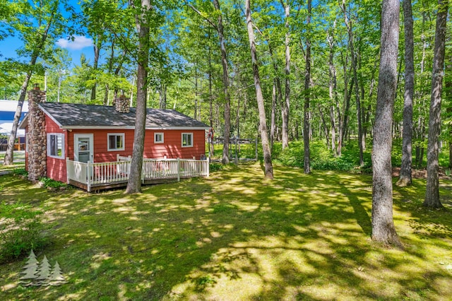 2931 Boulan Dr, Lewiston, MI 49756 - view of yard featuring a deck