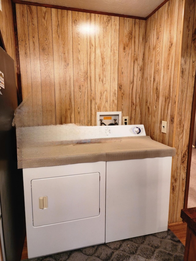 laundry room with laundry area, wooden walls, carpet flooring, and hookup for a washing machine
