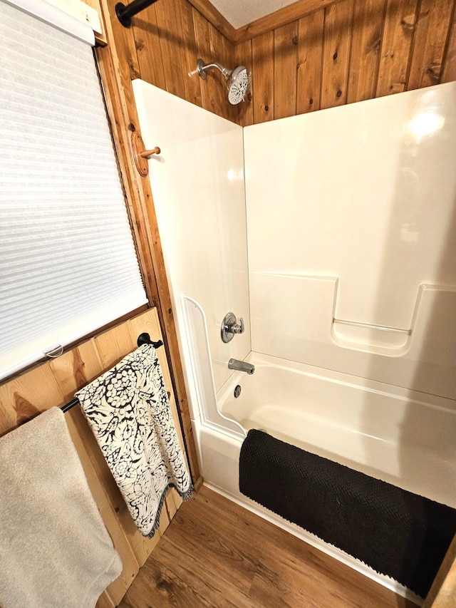 full bath with shower / bathtub combination and wood finished floors