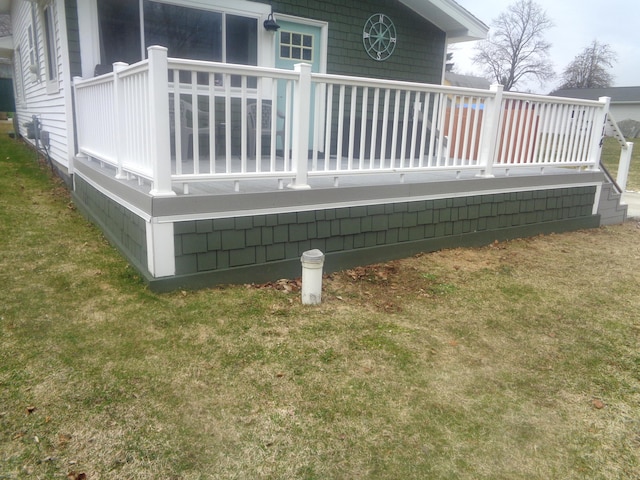 wooden deck with a yard
