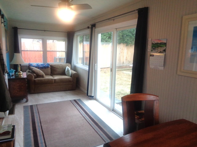 interior space with plenty of natural light and a ceiling fan