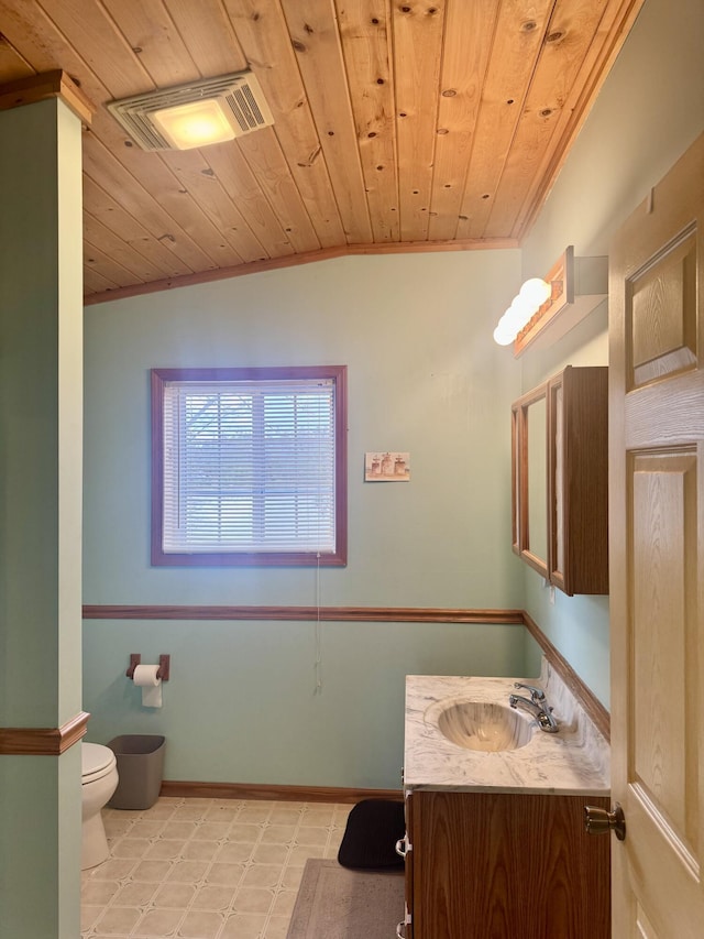 bathroom with crown molding, wooden ceiling, toilet, and visible vents