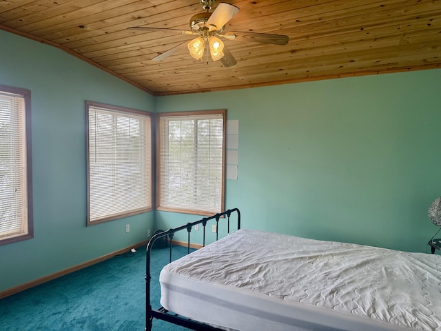 carpeted bedroom with wood ceiling, baseboards, vaulted ceiling, and ceiling fan