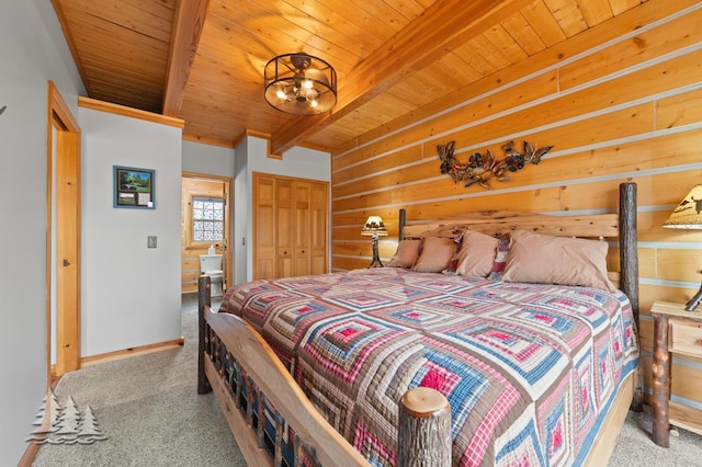 bedroom featuring wood ceiling, beam ceiling, carpet floors, baseboards, and a closet