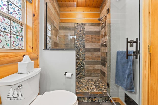 full bath with wooden ceiling, a shower stall, and toilet