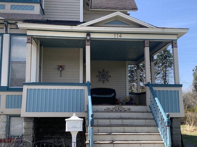entrance to property with a porch