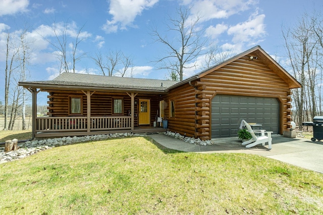 log-style house with log siding, a garage, a front yard, covered porch, and driveway