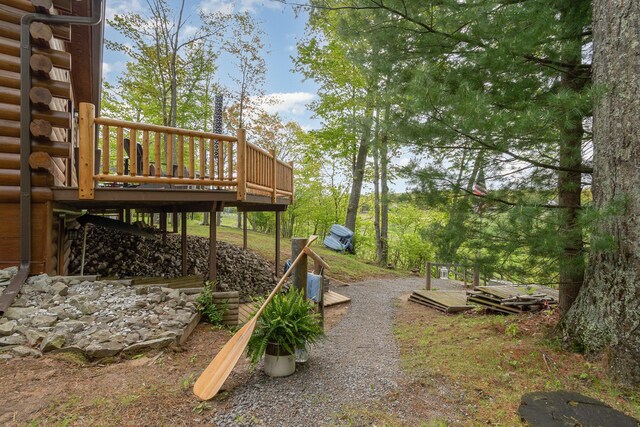 3525 E Pointe Dr, Beaverton, MI 48612 - view of yard featuring a wooden deck