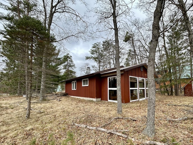 view of side of property featuring board and batten siding
