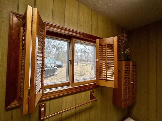 interior space featuring wood walls
