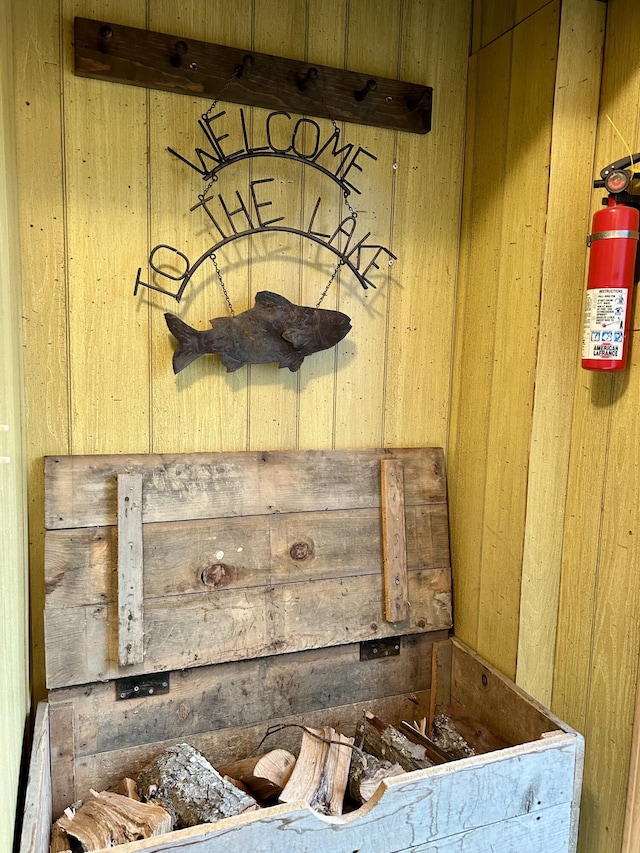 interior details with a fire extinguisher and wood walls