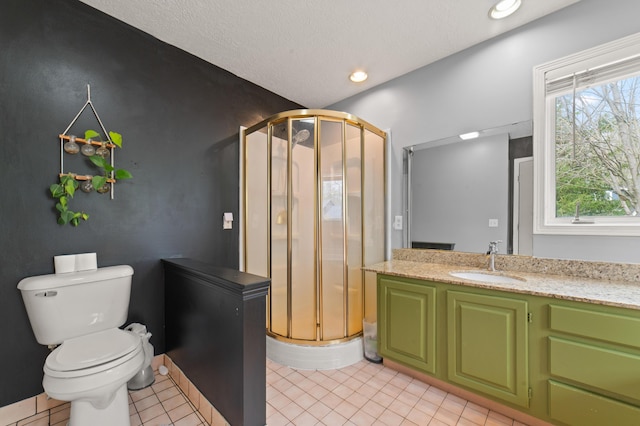 1406 Opal Lake Rd, Gaylord, MI 49735 - full bath with a shower stall, toilet, vanity, recessed lighting, and tile patterned flooring