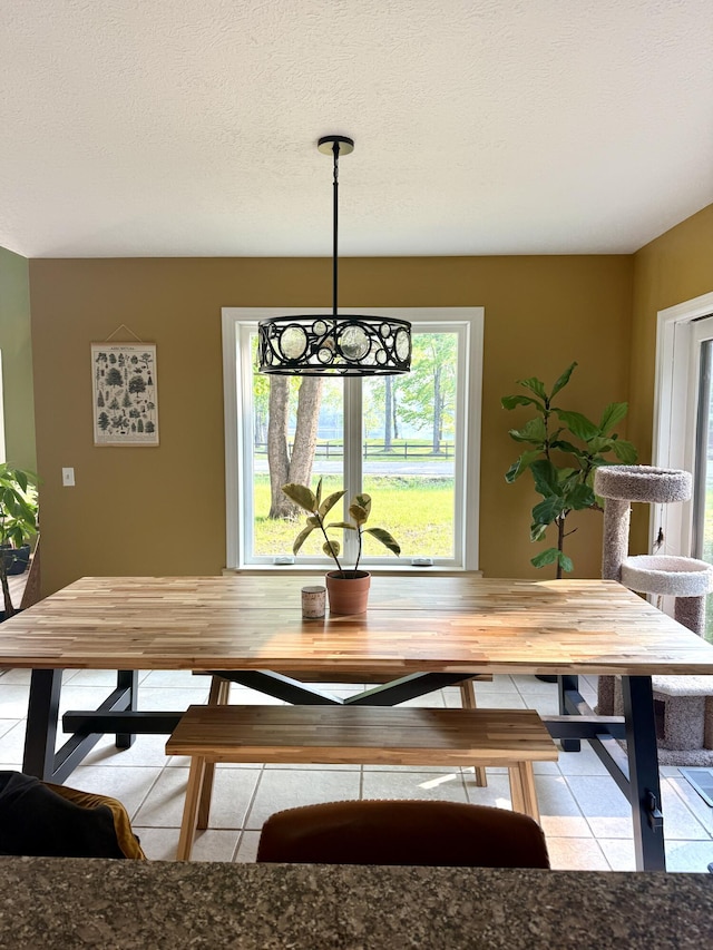 1406 Opal Lake Rd, Gaylord, MI 49735 - dining space with tile patterned flooring
