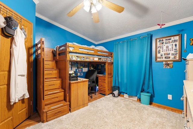 6075 W Edgar St, Pellston, MI 49769 - bedroom featuring ornamental molding, a desk, and ceiling fan