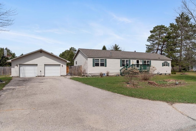6075 W Edgar St, Pellston, MI 49769 - ranch-style house featuring a detached garage and an outdoor structure
