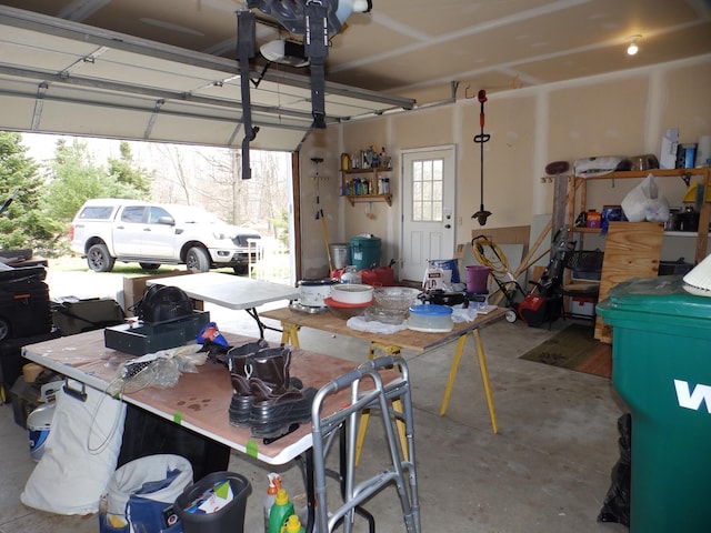 garage featuring a garage door opener