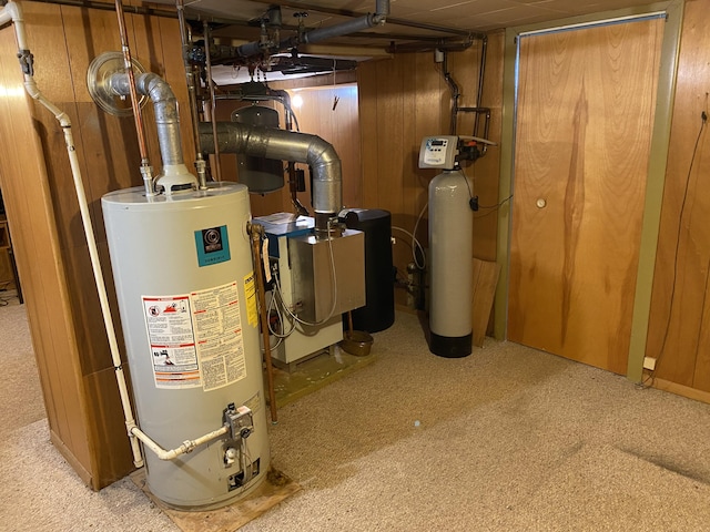 utility room with gas water heater