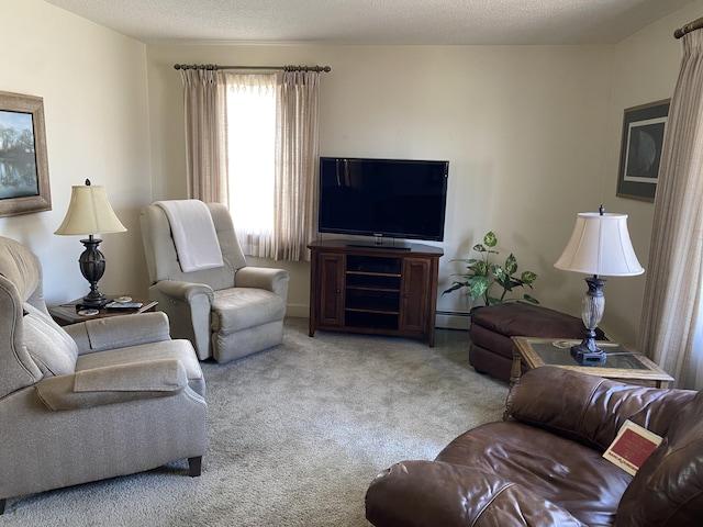 carpeted living room featuring a baseboard heating unit