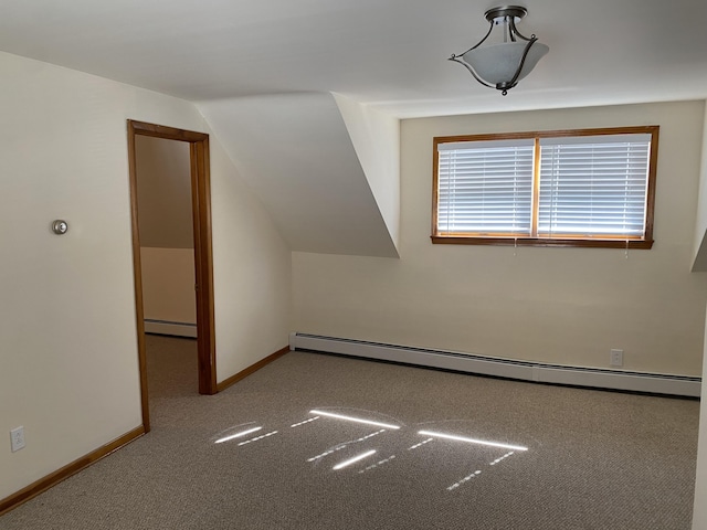 bonus room with carpet floors, baseboards, vaulted ceiling, and a baseboard radiator