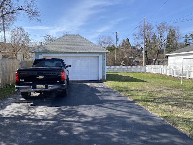 detached garage with fence