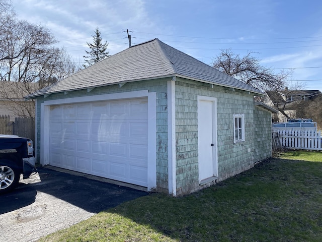 detached garage with fence