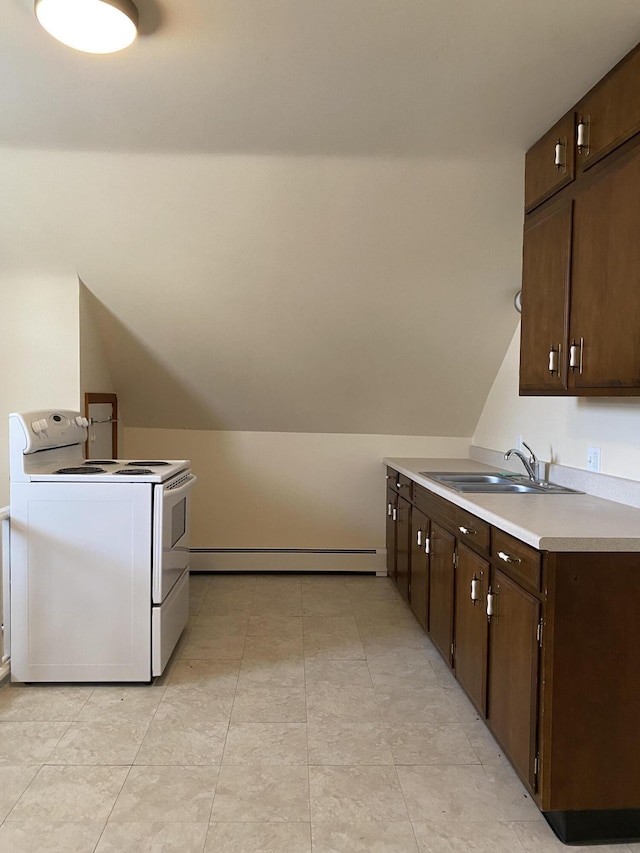 laundry room with cabinet space, a sink, and a baseboard radiator
