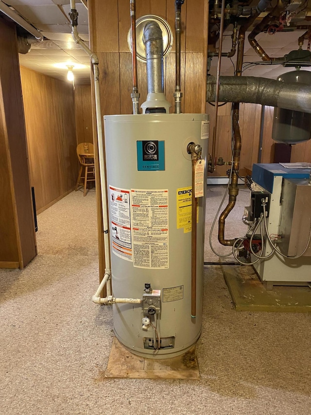 utility room with water heater