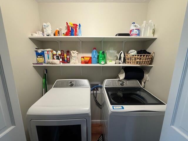 laundry room featuring laundry area and washer and clothes dryer