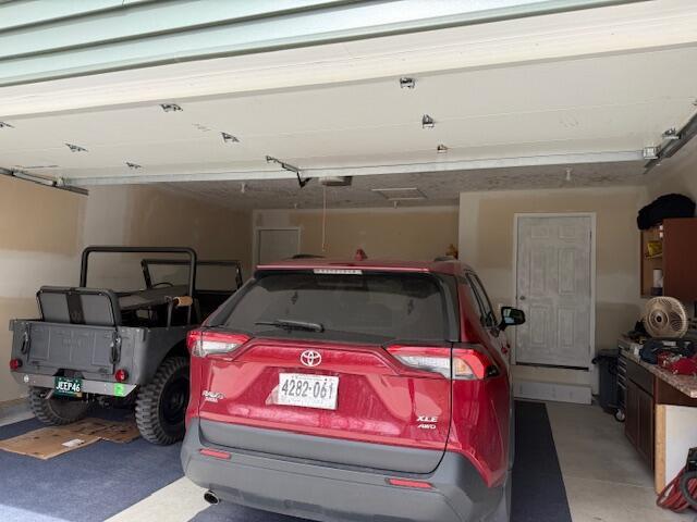 garage with a garage door opener