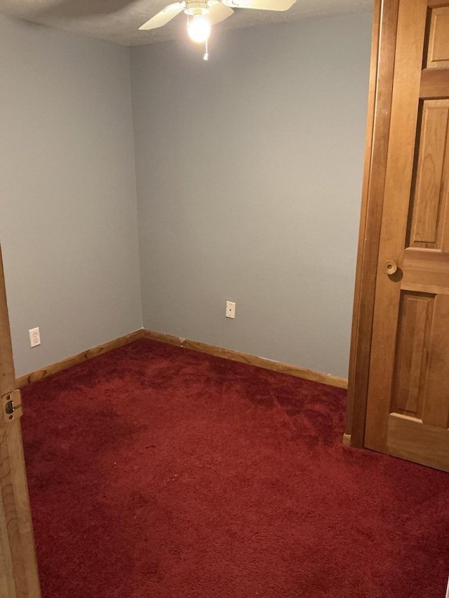 120 Marina St, Houghton Lake, MI 48629 - carpeted empty room featuring a ceiling fan and baseboards