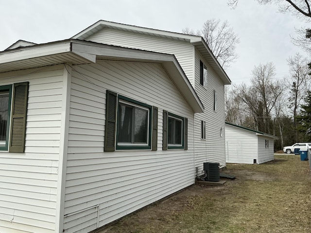 120 Marina St, Houghton Lake, MI 48629 - view of home's exterior featuring cooling unit