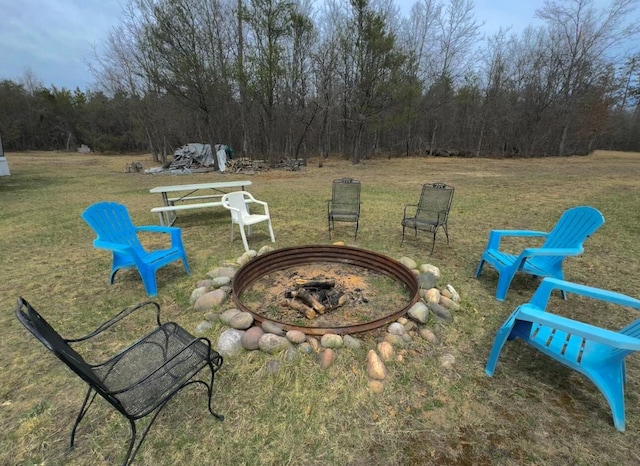 427 Goline Rd, Grayling, MI 49738 - view of patio / terrace featuring an outdoor fire pit