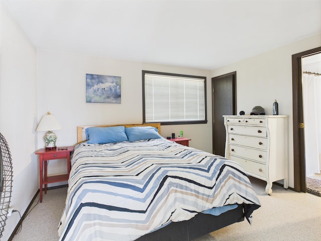 bedroom featuring carpet