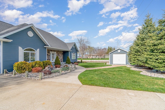 view of side of property featuring a shingled roof, a garage, an outdoor structure, a yard, and driveway