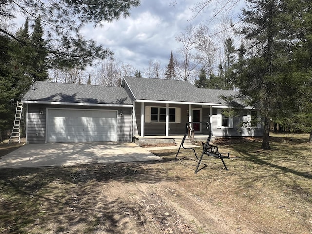 3047 Timberlane Trl, Grayling, MI 49738 - single story home featuring covered porch, an attached garage, roof with shingles, and dirt driveway