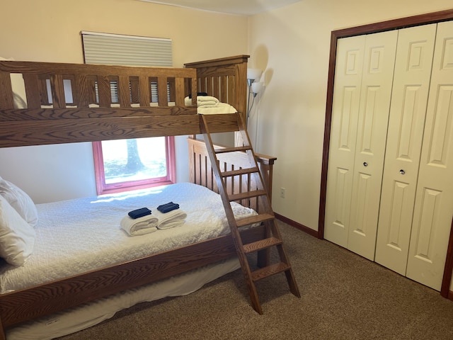 3047 Timberlane Trl, Grayling, MI 49738 - carpeted bedroom with baseboards and a closet