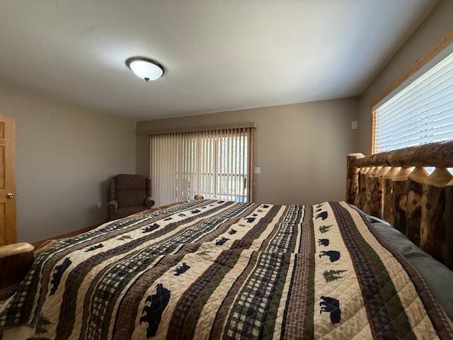 bedroom featuring multiple windows