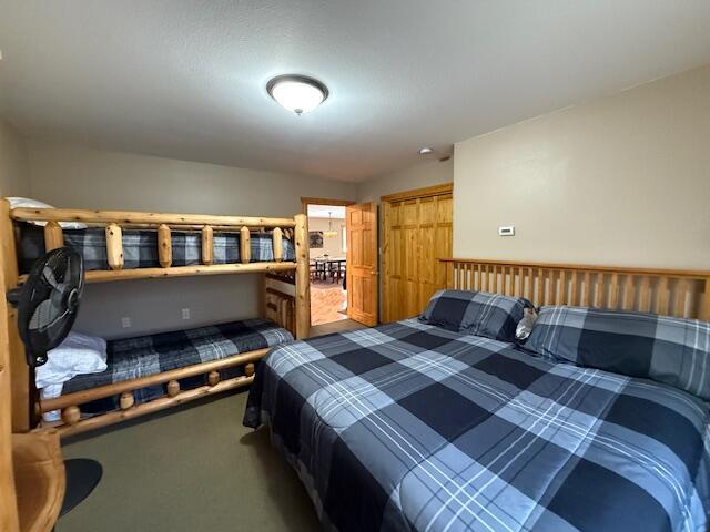 8670 N Everett Rd, Roscommon, MI 48653 - view of carpeted bedroom