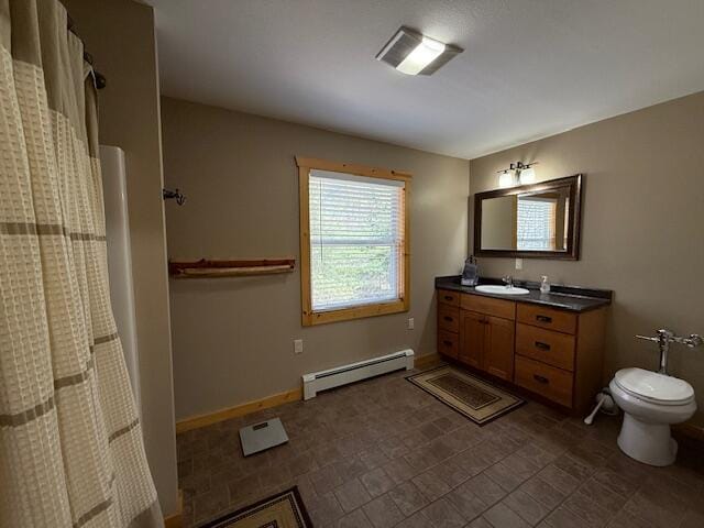 full bath featuring a shower with curtain, vanity, a baseboard radiator, baseboards, and toilet