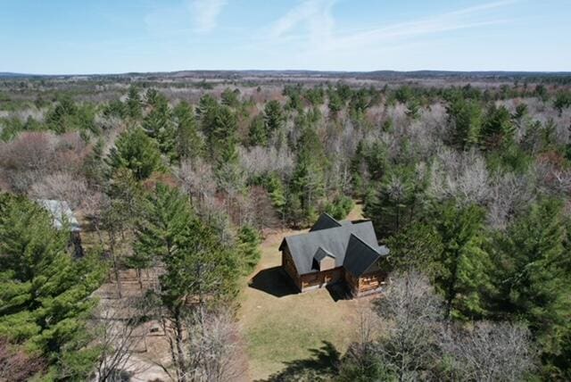 bird's eye view featuring a view of trees