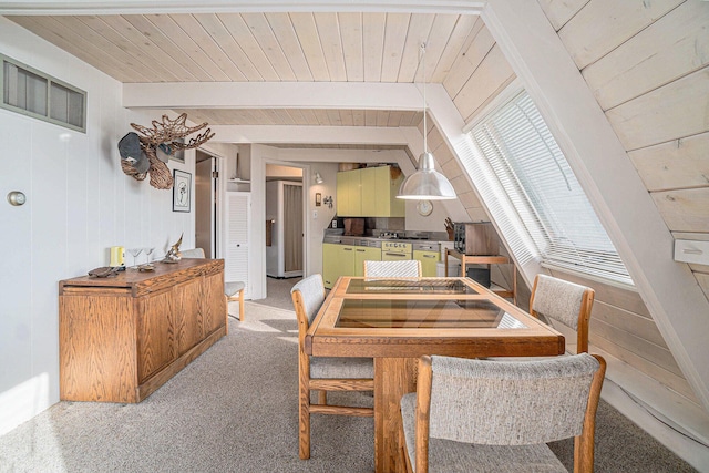 2047 W Martin Lake Rd, Gaylord, MI 49735 - dining room featuring wooden walls, visible vents, wooden ceiling, and beam ceiling